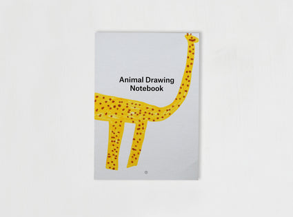 Cover from our Animal Drawing notebook with children drawing of a giraf