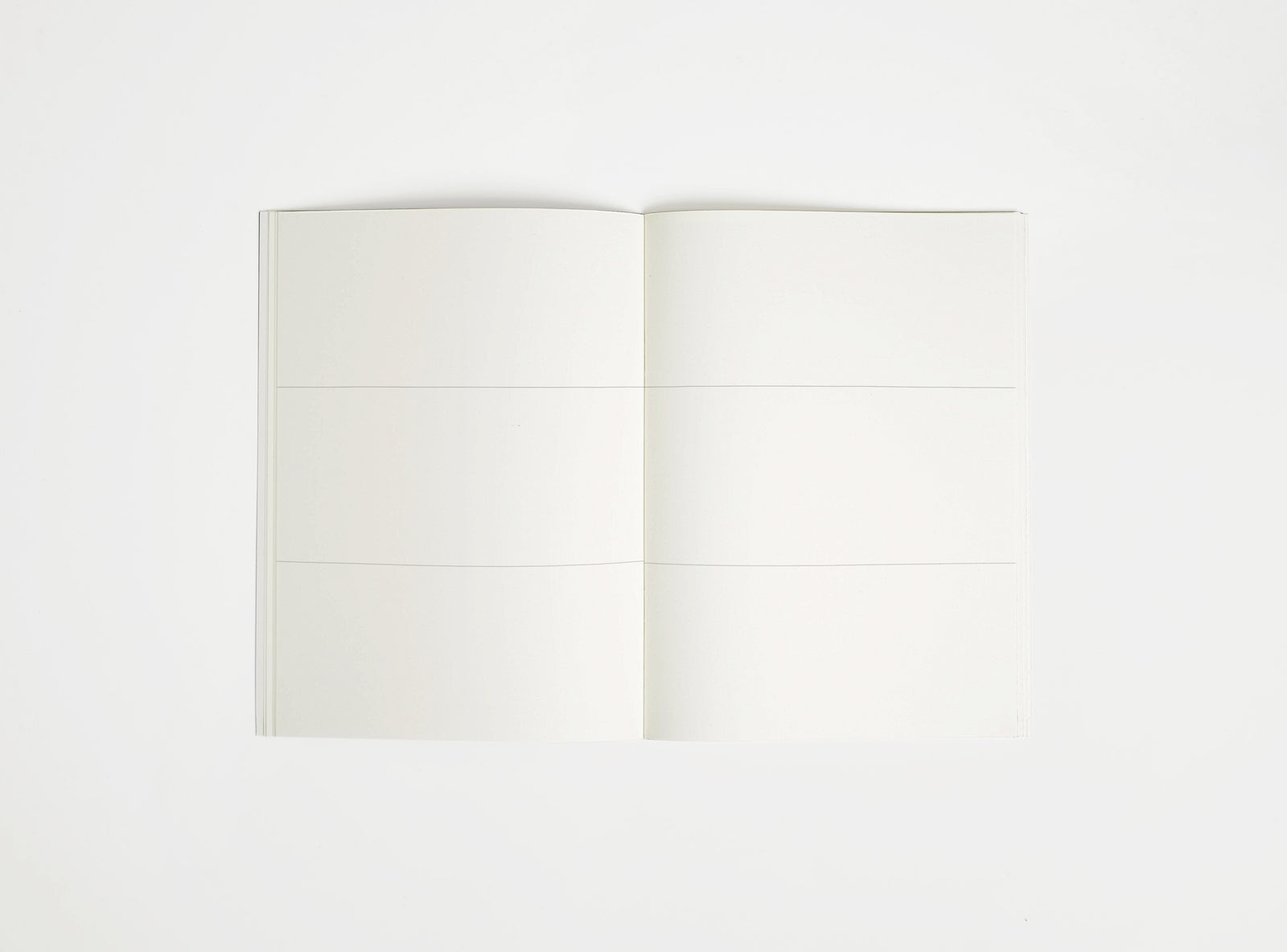 Open notebook booq with white pages on a white background