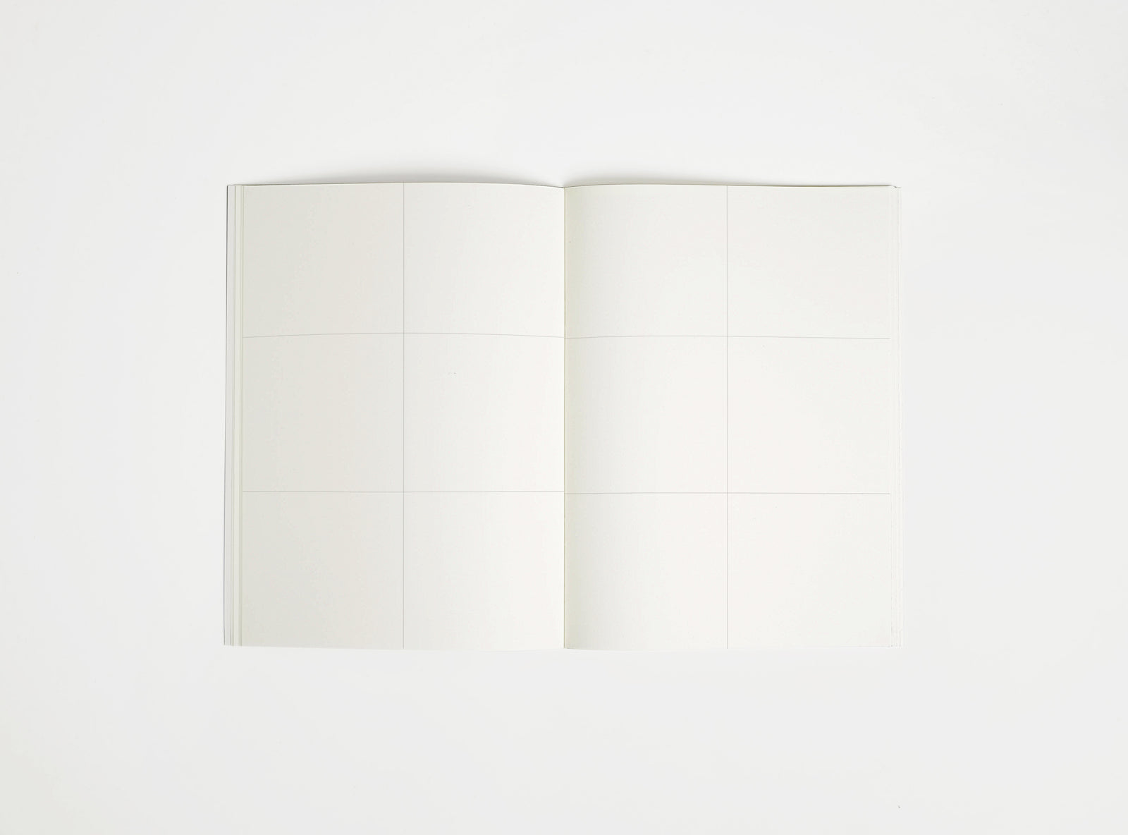 Open notebook booq with white pages on a white background