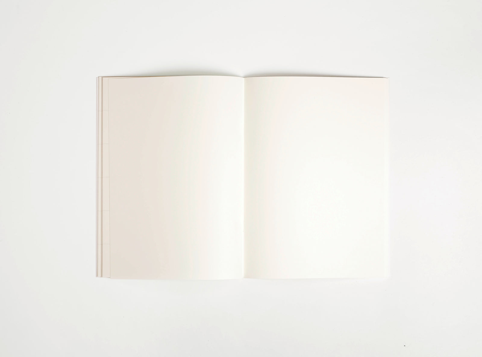 notebook spread of booq plain paper off white on white background