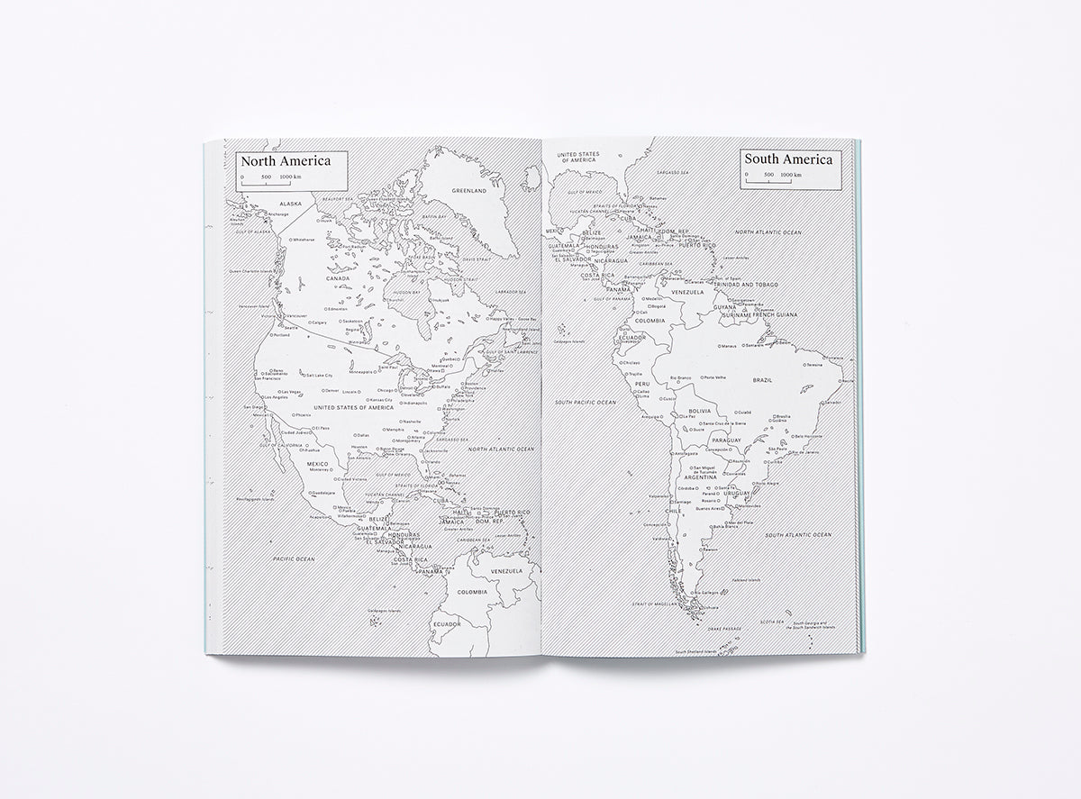 Spread of our 2023 planner showing North America and South America maps.