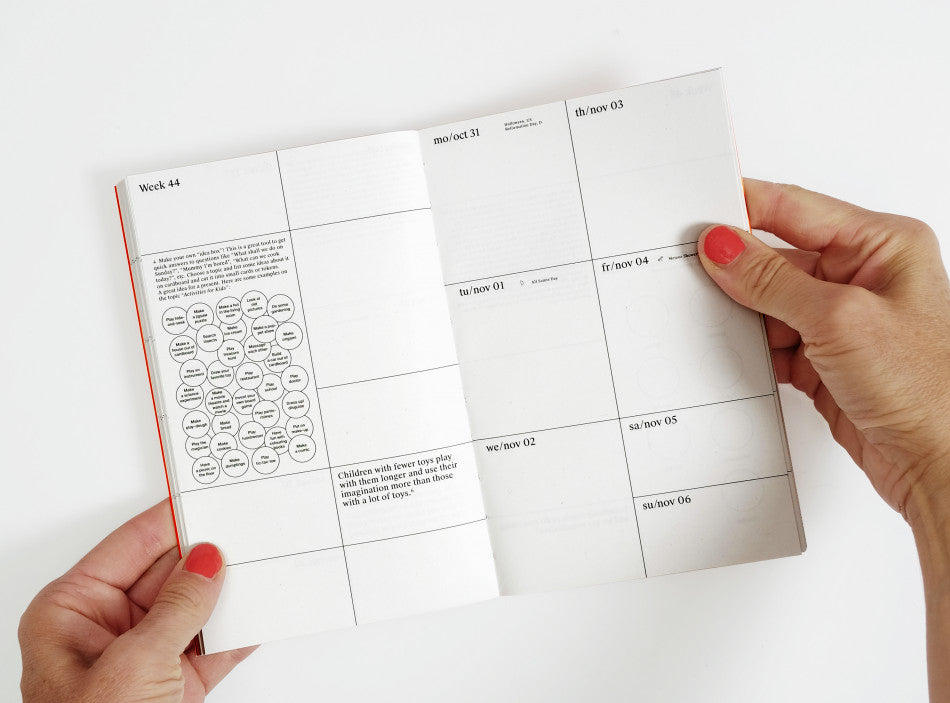 Spread of our 2022 planner with the week view and illustrations.