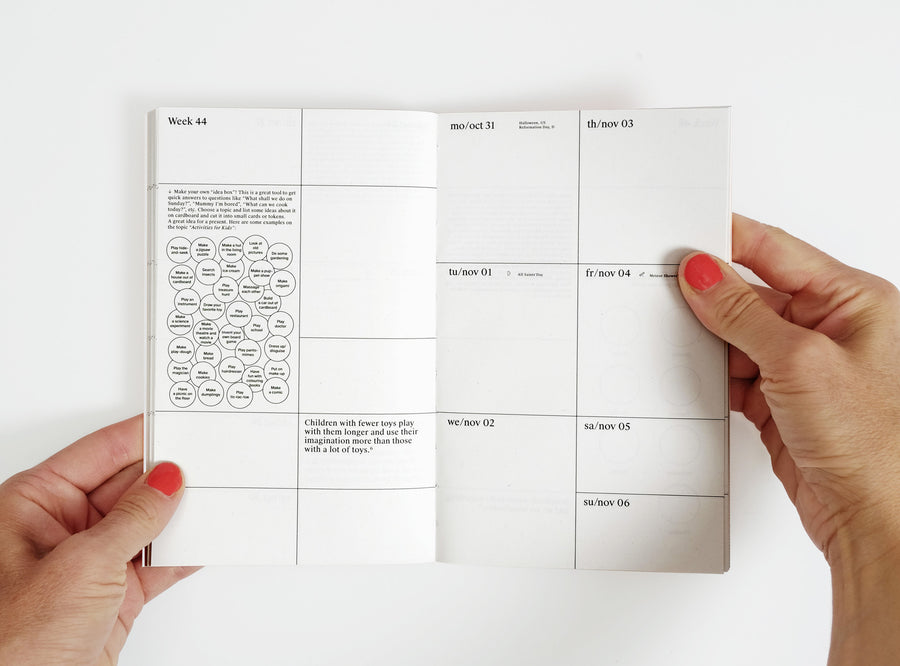 Spread of our 2022 planner with the week view and illustrations.