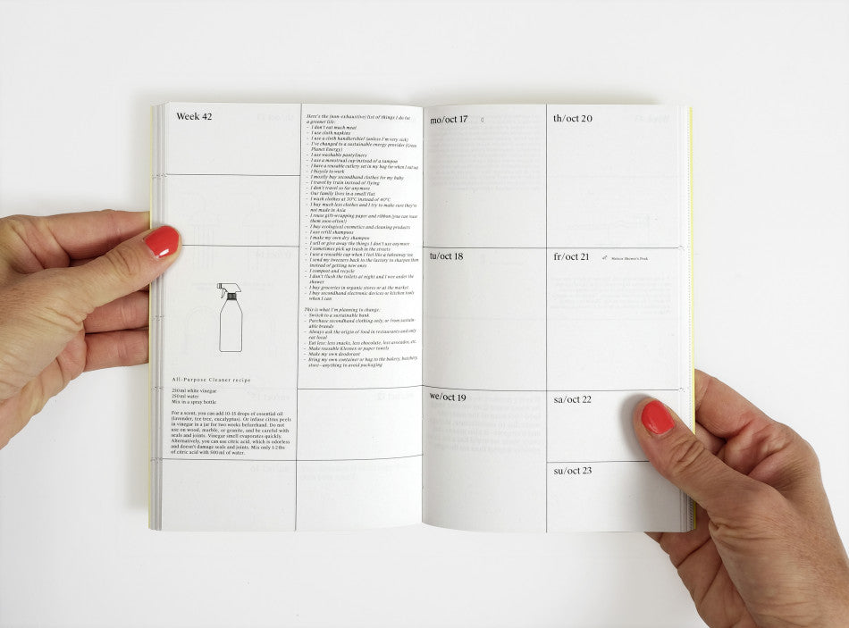 Spread of our 2022 planner with the week view and illustrations.