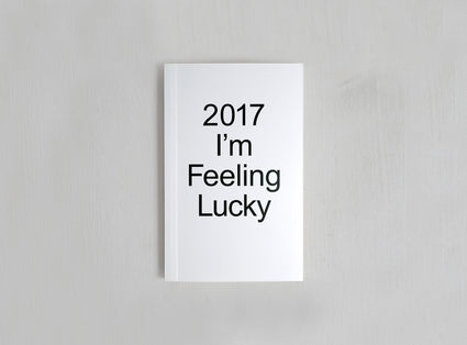 White planner from 2017 which motto was I'm Feeling Lucky.