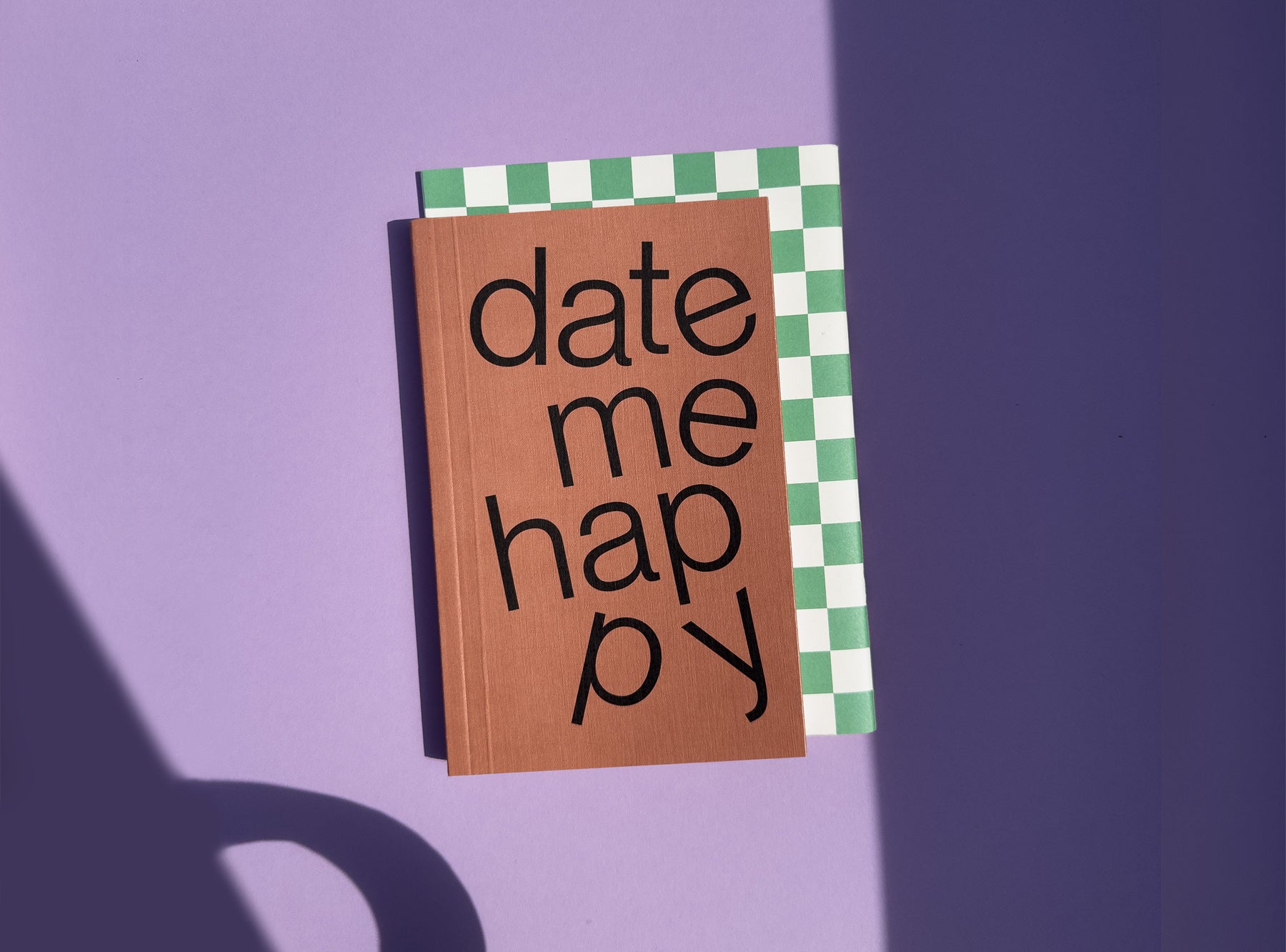 Date me happy undated planner edition julie joliat x redfries on purple background with notebook