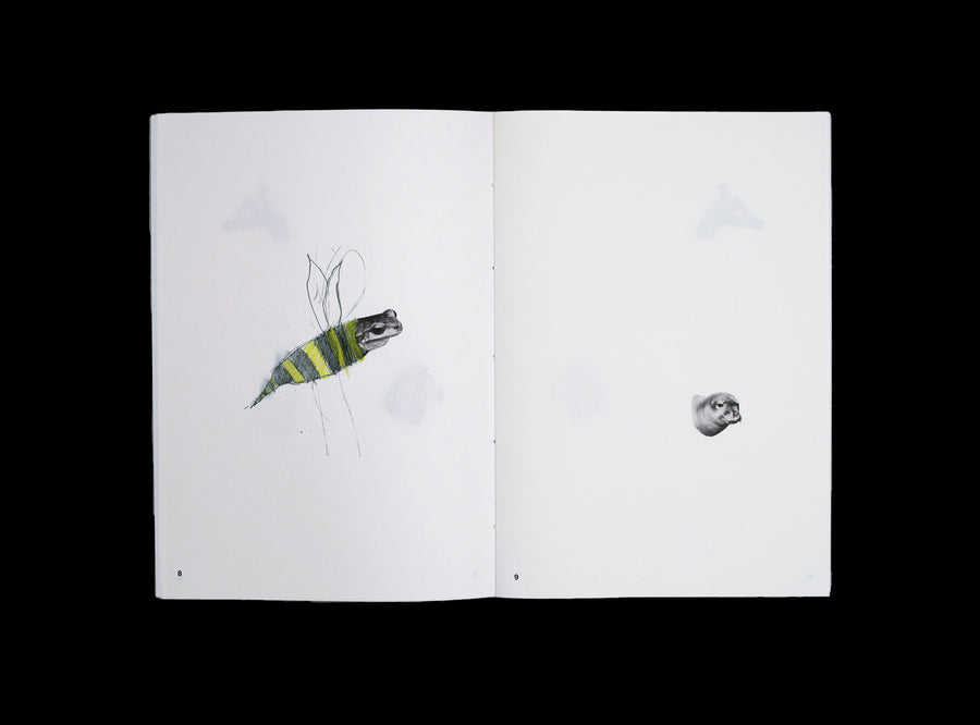 Spread from our Animal Drawing notebook with children drawing.
