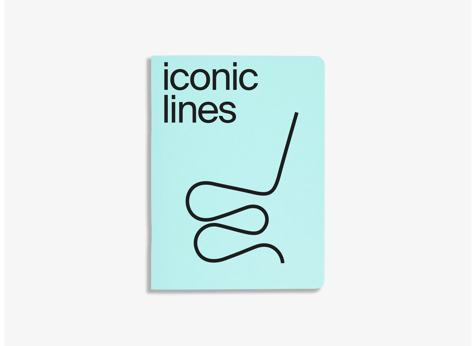 iconic lines notebook about iconic design pieces, blue cover on white background 