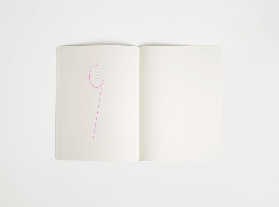 Open notebook with a pink drawing suggesting Sottsass table lamp on white background, the iconic design piece