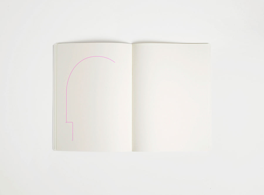Open notebook with a pink drawing suggesting Arco Lamp on white background, the iconic design piece