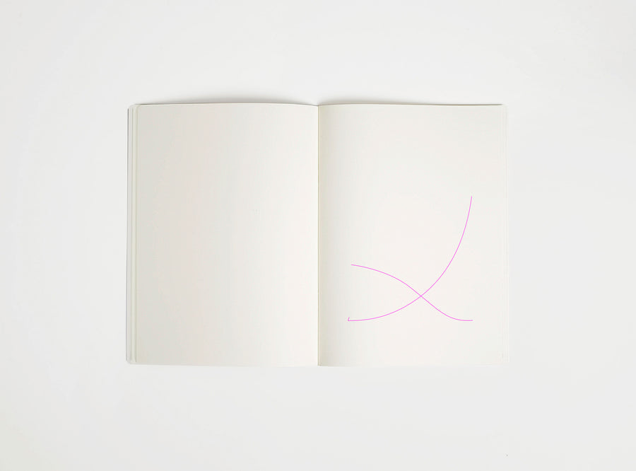Open notebook with a pink drawing suggesting Mies van der Rohe Barcelona Chair on white background, the iconic design piece