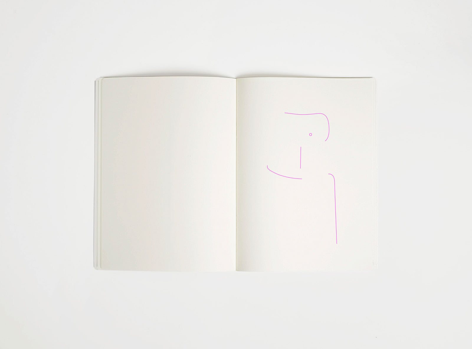 Open notebook with a pink drawing suggesting Eiermann SE68 Chair on white background, the iconic design piece