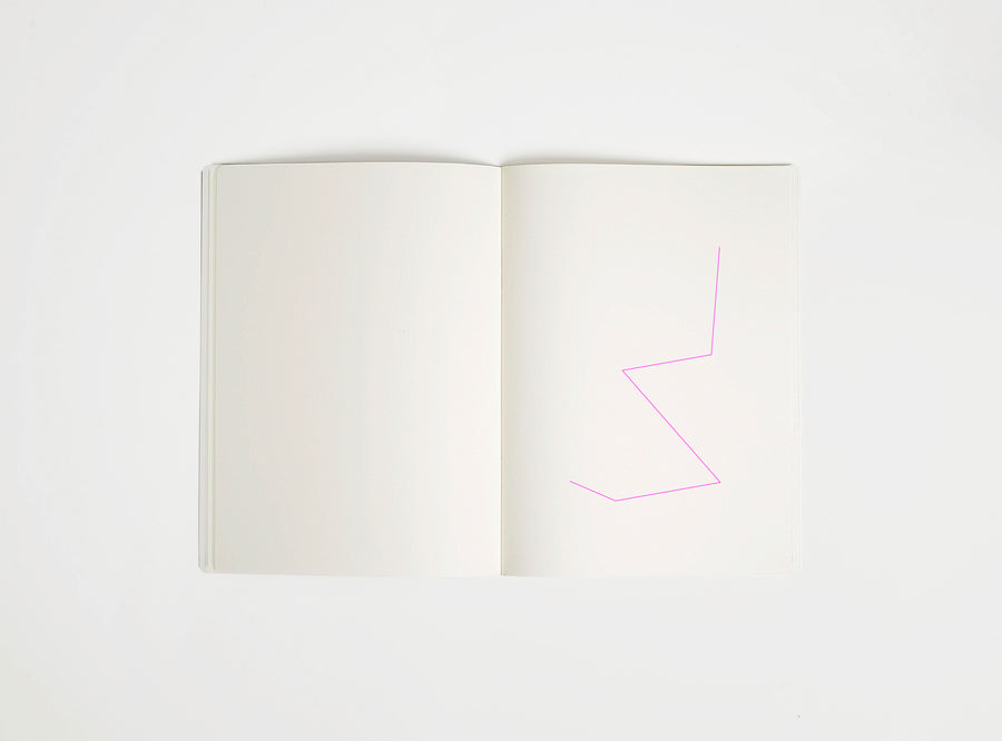 Open notebook with a pink drawing suggesting Rietveld Zig-Zag on white background, the iconic design piece