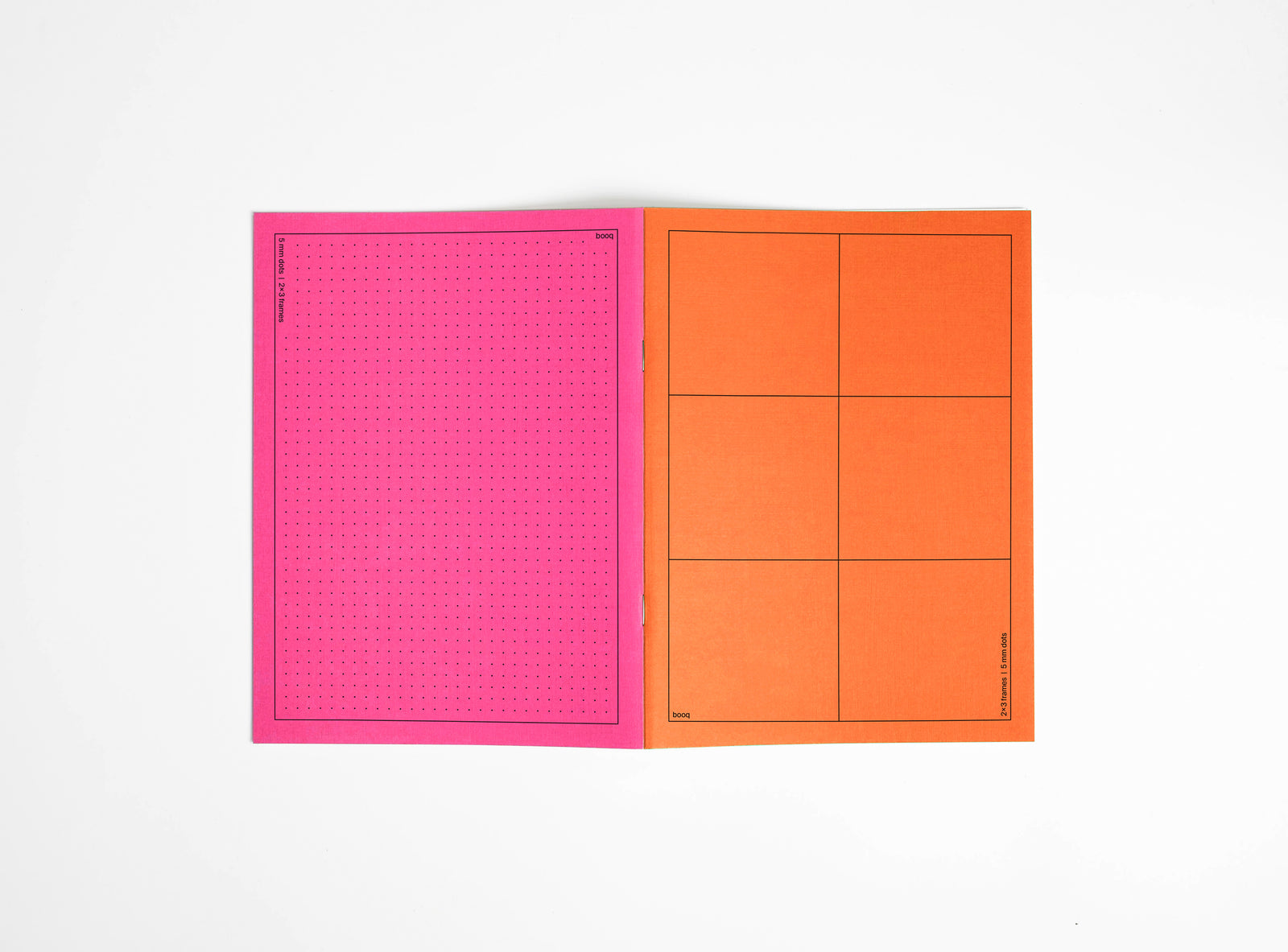 notebook orange and pinke open to see the covers on white background
