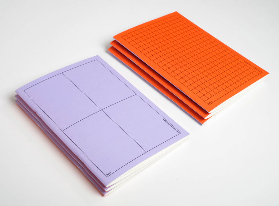 1 purple and one orange  pile of notebooks booq on a white background