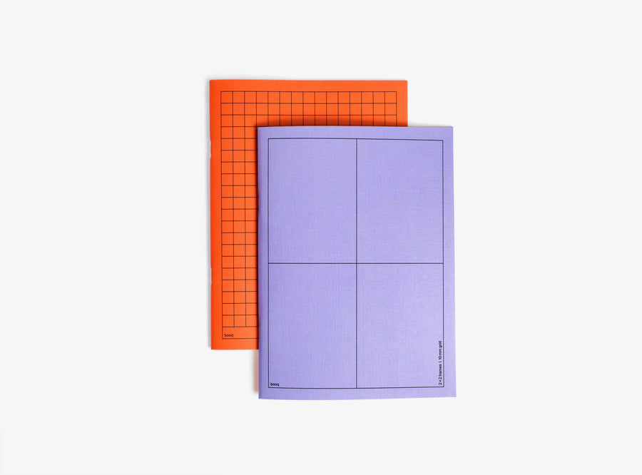 violet and orange softcover notebook booq on white background