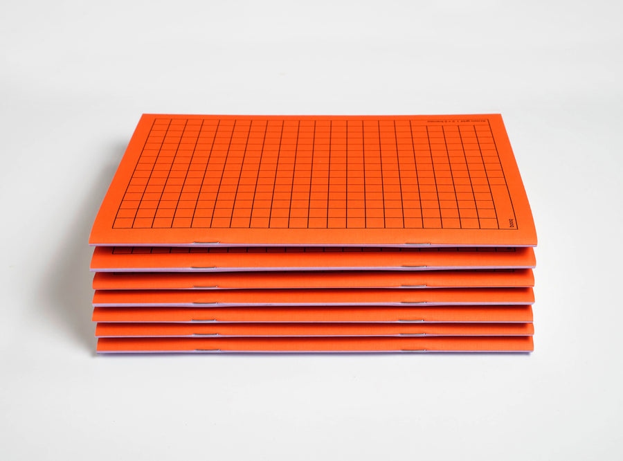 1 pile of orange notebooks booq on a white background