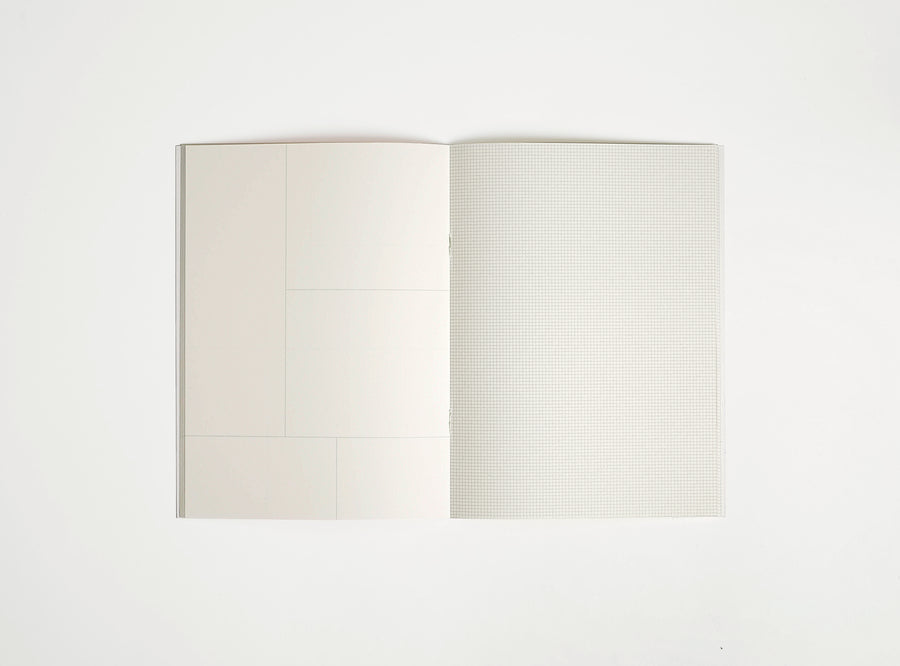 softover notebook booq open in the middle on white background, 2 mm grid print inside + frames