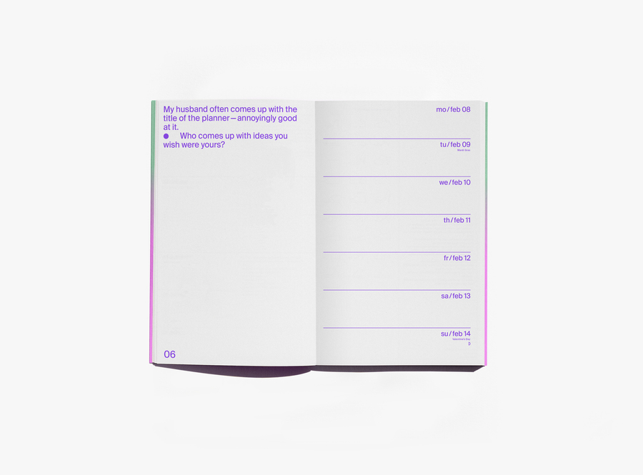 An open edition julie joliat planner agenda 2027 showing a page with purple text on the left and a weekly schedule layout on the right, photographed on a clean white background.