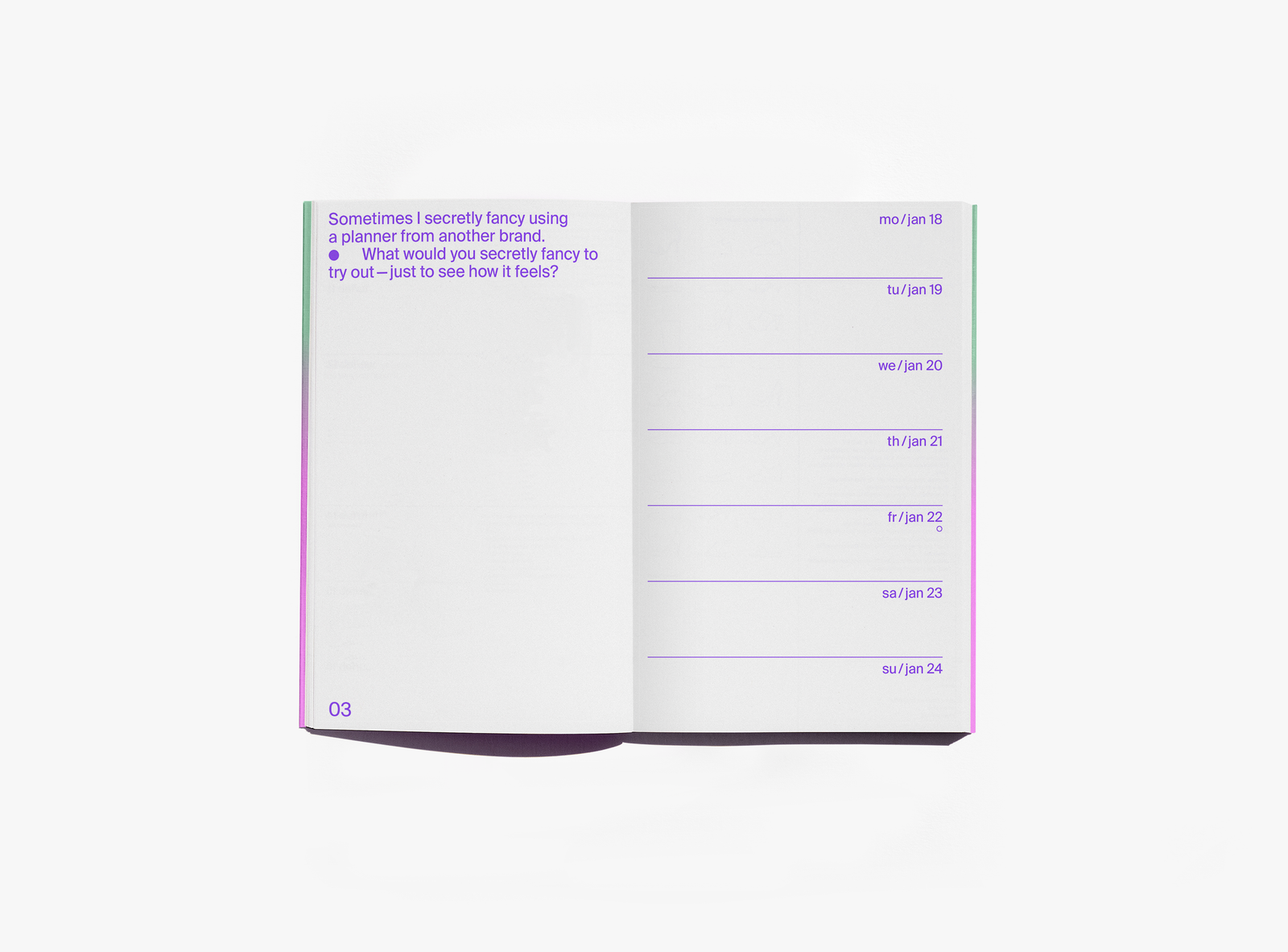 An open edition julie joliat planner agenda 2027 showing a page with purple text on the left and a weekly schedule layout on the right, photographed on a clean white background.
