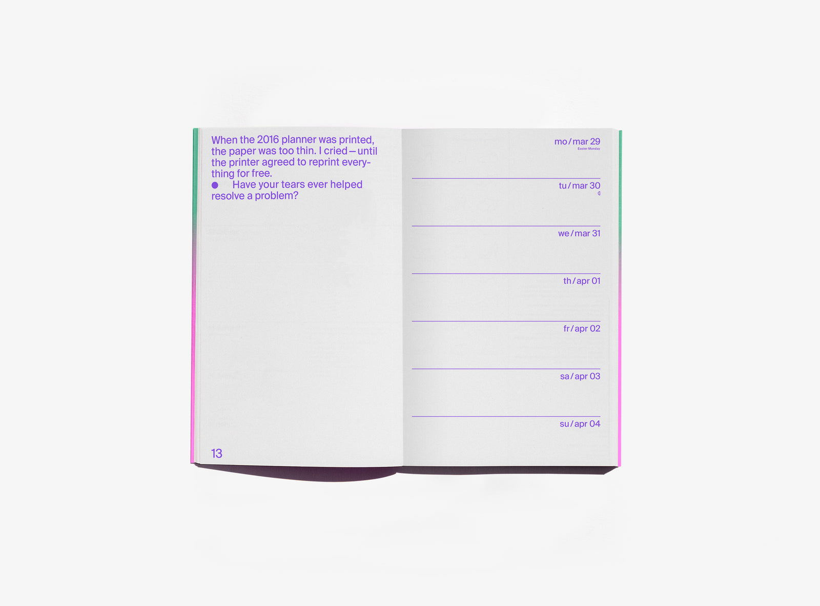 An open edition julie joliat planner agenda 2027 showing a page with purple text on the left and a weekly schedule layout on the right, photographed on a clean white background.