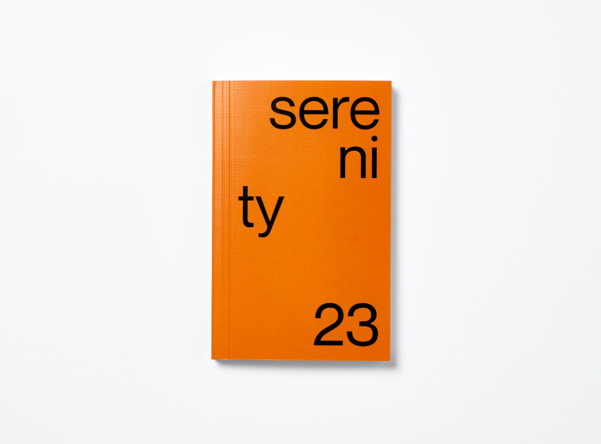 Cover from our 2023 planner in orange with the motto Serenity.