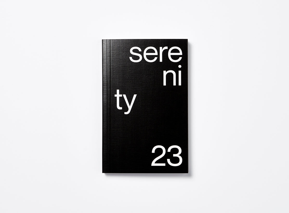 Cover from our 2023 planner in black with the motto Serenity.
