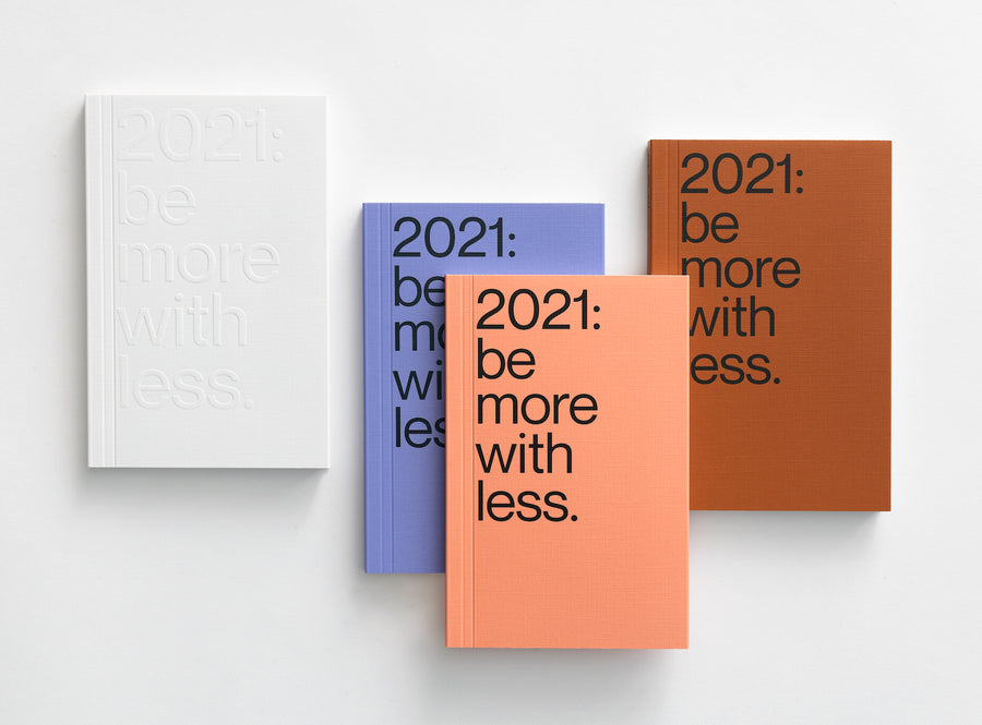 All covers from our 2021 planner, in white, violet, salmon and brown.