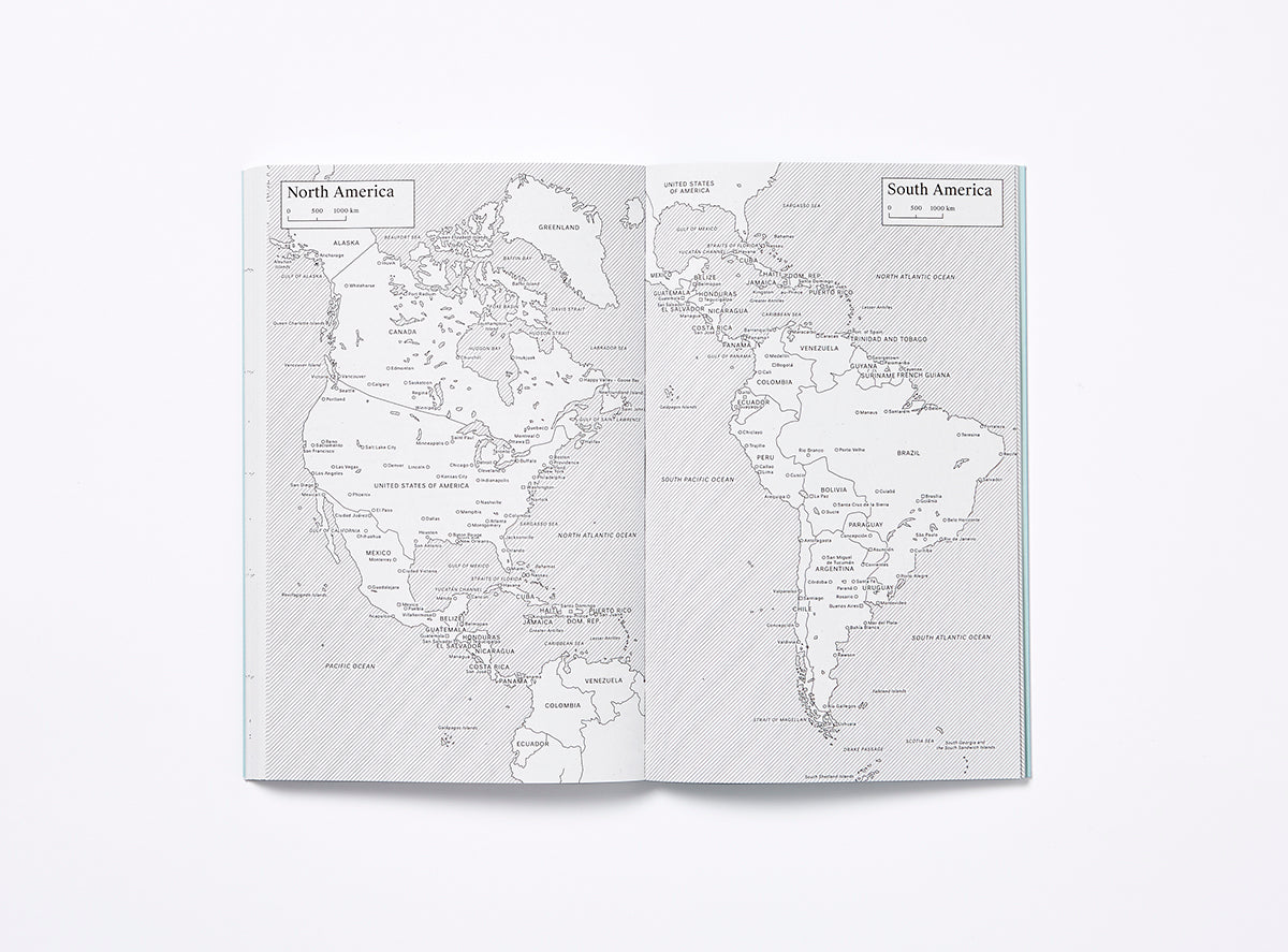 Spread of our 2023 planner showing North America and South America maps.