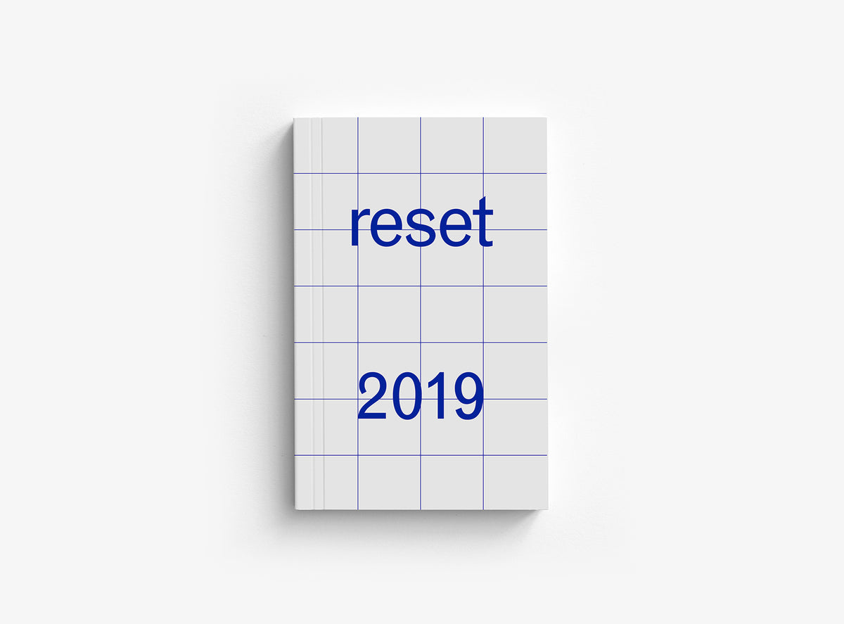 Cover from our 2019 planner which motto was reset 2019.