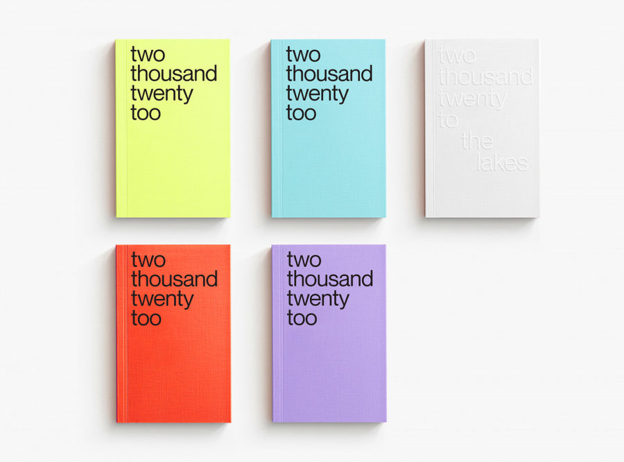 All covers from our 2022 planner, in lime, light blue, white, red and violet.